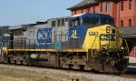 CSX 24 leads a train northbound past the station